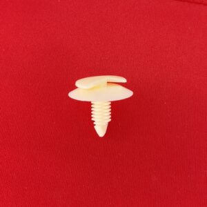 Broche - Pinche - Sujetador para tapizado de puerta.